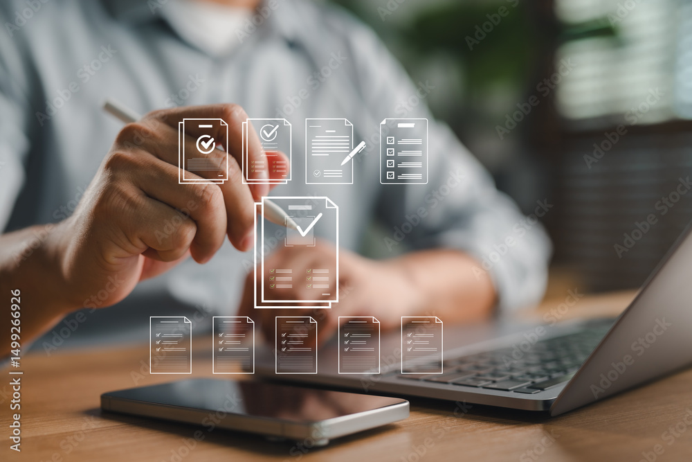 Fototapete Checklist and document management system concept with digital quality control. Man using tablet and laptop to verify online forms, audits, and workflow approval with futuristic interface icons.