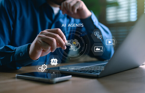 AI agents and intelligent assistant concept with command prompt interface. Man using stylus with laptop and tablet to control multi-modal AI tools for image, video, text, and automation tasks.