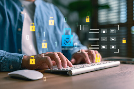 Cybersecurity and password protection concept. Man typing on keyboard with digital lock icons, encrypted access, secure login credentials, identity safety, and data privacy for online protection. - Powered by Adobe