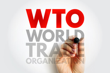WTO World Trade Organization - intergovernmental organization that regulates and facilitates international trade between nations, acronym text concept background