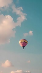 Fototapeta premium Colorful hot air balloons flying high in the sky with an adventure spirit