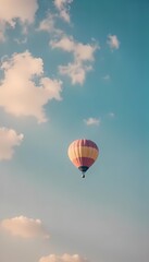 Fototapeta premium Colorful hot air balloons flying high in the sky with an adventure spirit