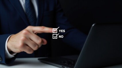 Businessperson selecting an option on a laptop.