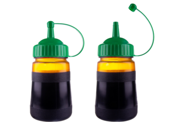 open and closed sweet soy sauce in plastic bottle isolated on white
