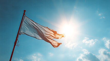 Juneteenth Flag Waving in Blue Sky - Symbol of Freedom