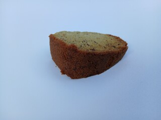A plate of banana cake, a traditional Indonesian cake made from bananas as the main ingredient, has a soft texture and sweet taste