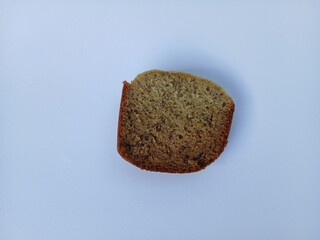 A plate of banana cake, a traditional Indonesian cake made from bananas as the main ingredient, has a soft texture and sweet taste