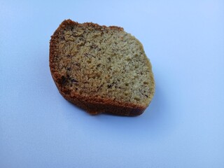A plate of banana cake, a traditional Indonesian cake made from bananas as the main ingredient, has a soft texture and sweet taste