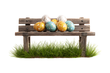 Easter eggs on rustic wooden bench in spring grass