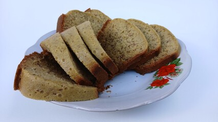 A plate of banana cake, a traditional Indonesian cake made from bananas as the main ingredient, has a soft texture and sweet taste