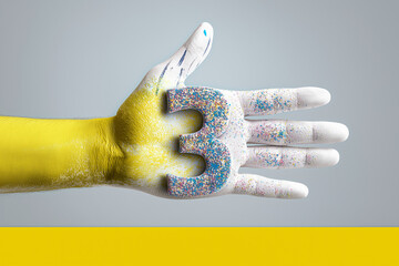 Painted hand holding number three – creative minimal composition for modern design use.