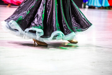 girl in junior dance dress for standard program at tournament