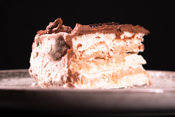 Plate with a piece of delicious homemade chocolate cake on the table. Chocolate cupcake. Dessert. Food