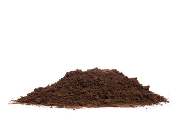 A pile of dark brown soil or dirt is seen against a plain black background in a studio setting here
