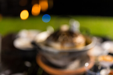 Blur background of Thai barbecue grill pork at outdoor in night time