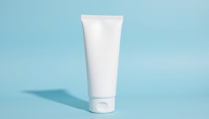 Minimalist White Tube Container on Light Blue Background for Skincare Product Display