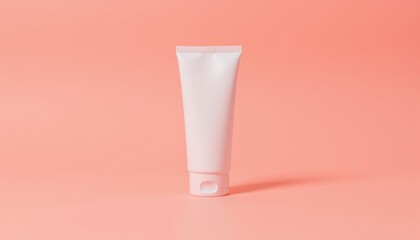 Minimalist Cosmetic Tube on Soft Coral Background for Beauty and Skincare Promotion
