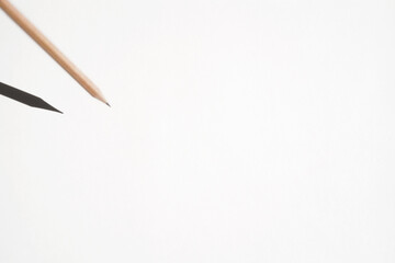 Abstract View of Graphite Pencil in Air over White Paper Background. Drawing, Sketching Mockup.	