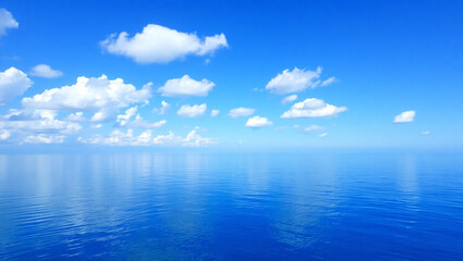 Obraz premium Blue sky with white cumulus fluffy cloud sea beach skyline. Morning beautiful sunlight nature seascape