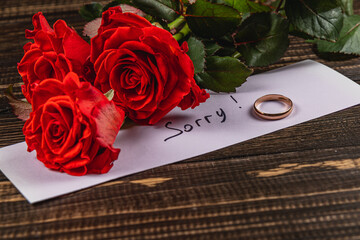 Broken engagement with roses and a heartfelt apology letter