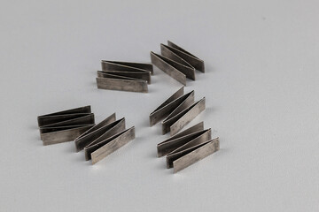 Allison Transmission Torque Converter Stator Spring zigzag shaped isolated on grey background.