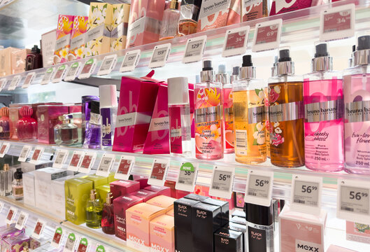 22 May 2025, Zory, Poland, Rossmann: A variety of perfumes neatly arranged on a store shelf in a cosmetics shop. Fragrance display for customers seeking beauty, luxury, and personal care products.