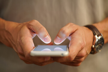 man holding a mobile phone