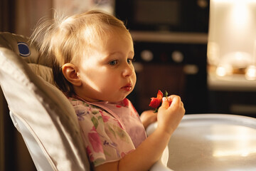 Cute Baby Girl Eating Strawberries For The First Time