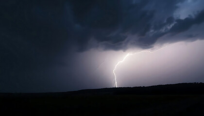 lightning bolt is seen in the sky above a field