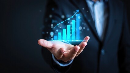 Businessman hand holding growing graph future success