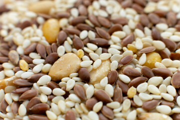 Macro close-up different seeds salad preparation. Healthy food. Veganism