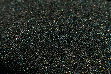 Close-up macro shot with shallow depth of field. Frozen bubbles of polyethylene foam. Sponge in extreme close-up