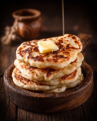 Stack of Syrniki being drizzled with honey, close-up shot, rustic style, wooden bowl, dark background, traditional food