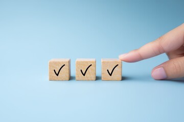 Hand Placing Checked Wooden Cubes, Selection and Decision Concept with Blue Background.