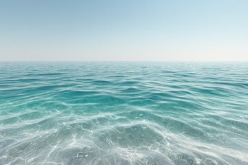 Calm turquoise ocean water with gentle waves under a clear blue sky in a serene seascape view of the horizon
