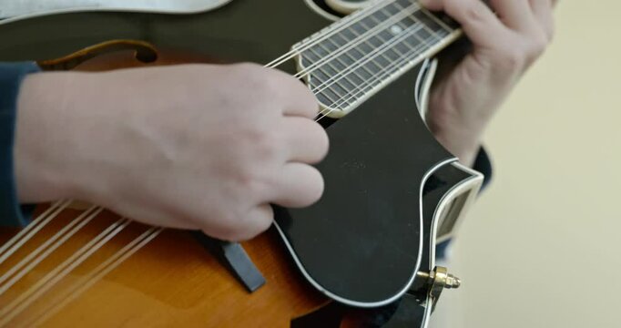 Caucasian Kid Play Mandolin at Home. European Boy Practice Music 4K 10-bit