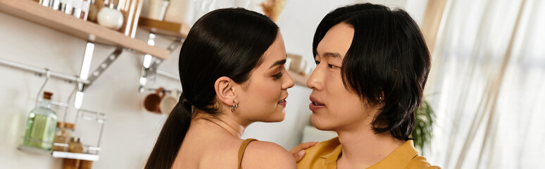 Couple enjoying intimate moments together in a cozy home atmosphere during a sunny afternoon