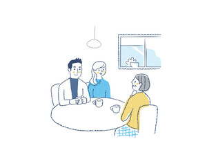 テーブルを囲んで話をしている3人