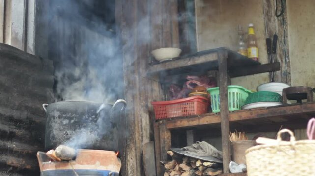 a big pot in an outside kitchen in Laos 