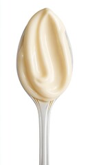 Mayonnaise Swirl on Spoon Close Up Studio Shot on White Background Perfect for Food and Cooking Concepts and Advertising