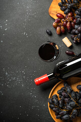 Fototapeta premium Red Wine at black background.