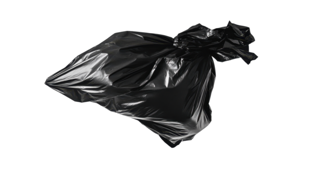 A crumpled, dark plastic garbage bag floats against a stark black background, its form suggesting contents within