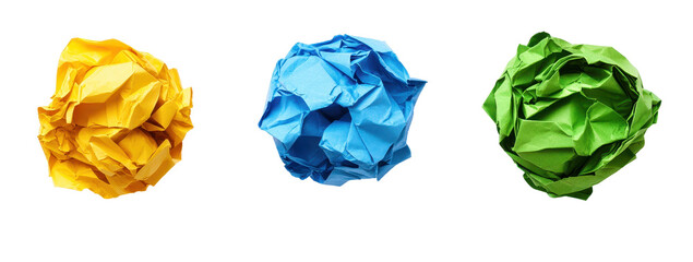 Three crumpled paper balls, yellow, blue, and green, against a black background