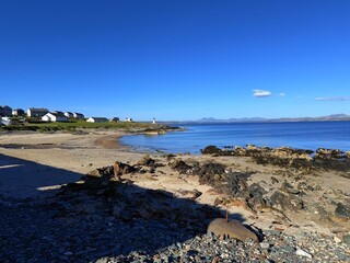 Port Charlotte is a town on the west coast of Islay, Scotland. Whisky distilleries and hotels dot the area, with scenic shorelines and historic charm.