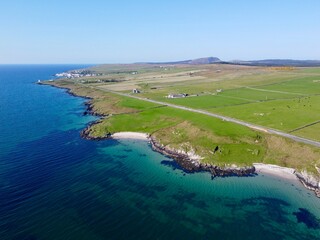 Port Charlotte is a town on the west coast of Islay, Scotland. Whisky distilleries and hotels dot the area, with scenic shorelines and historic charm.