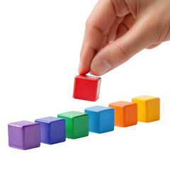 Obraz premium Hand placing colorful blocks on transparent background