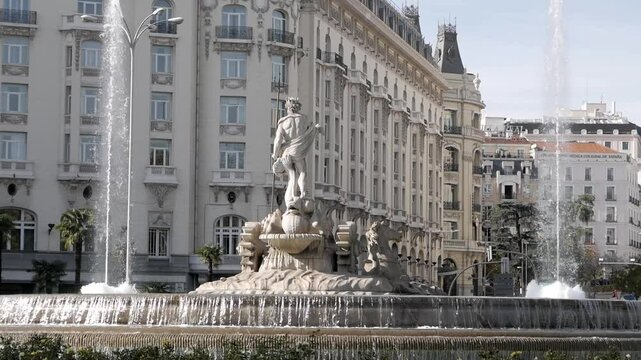 Palace Hotel Neptuno Fountain, located in Madrid, captured with a beautiful fountain
