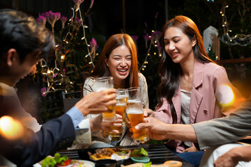 Food and Drinks: Men and women enjoy drinking beer and clinking glasses at a bar or pub.