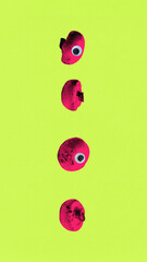 Abstract art collage. Vertical row of red mushrooms with plastic cartoon eyes arranged on lime background evokes lineup of weird staring characters. Concept of food expression, surreal line, humor.