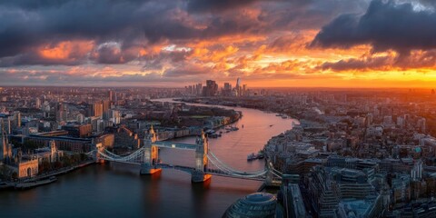 Fototapeta premium Dramatic London Skyline at Sunset with Tower Bridge and Thames River Panorama